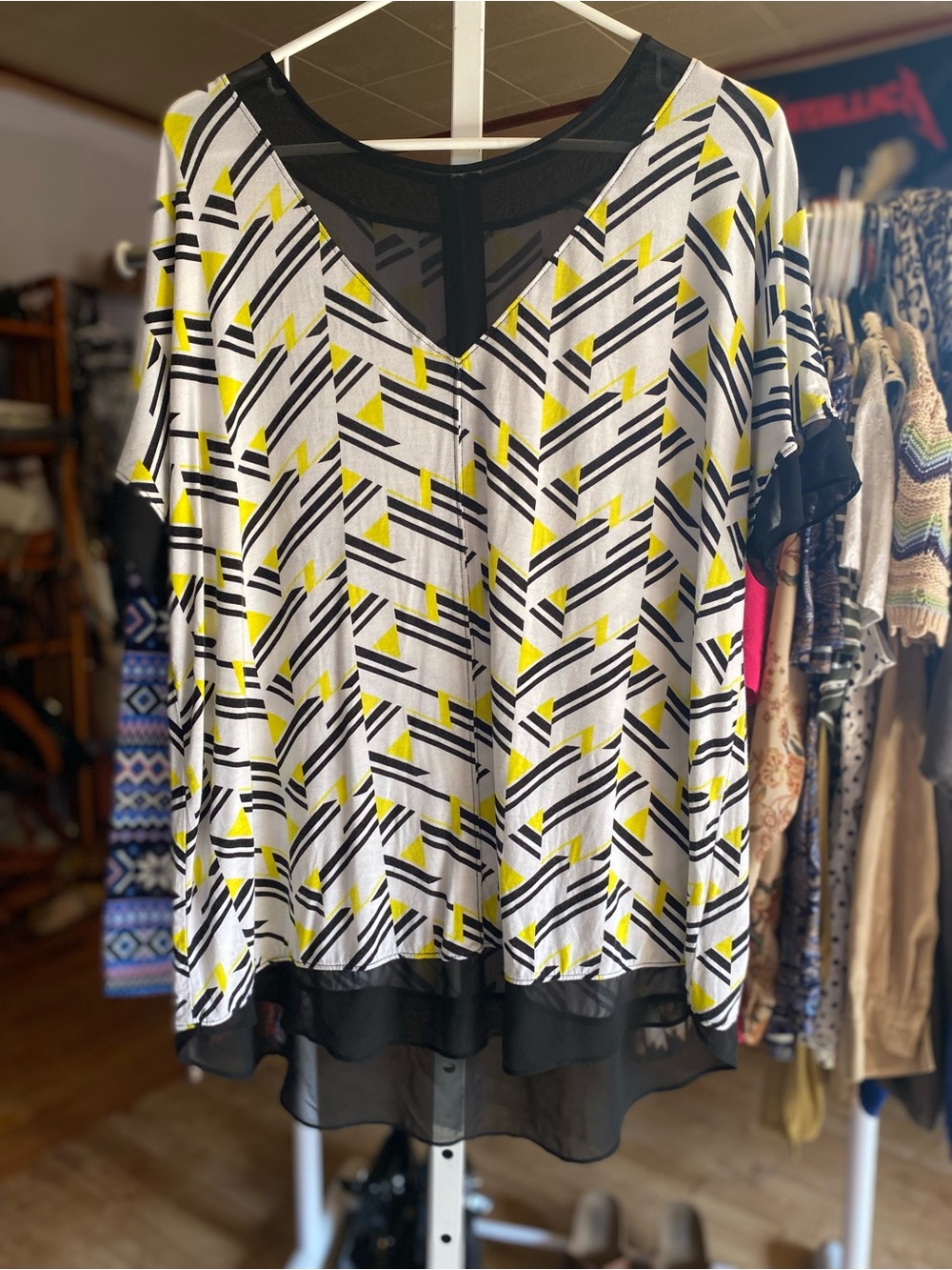 V-Neck Black & White Geometric Blouse with Sheer panel trim and yellow Accents